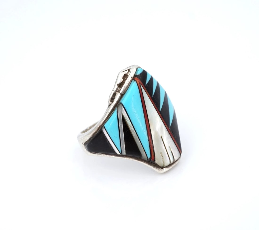 Zuni Gemstone Inlay Band Ring Sterling Silver Size 11 Artisan Signed RS3947: This beautiful Zuni artisan ring features inlaid turquoise, mother of pearl, onyx, and spiny oyster set flush in a solid sterling silver mount. This ring is the perfect gift for yourself or someone yo