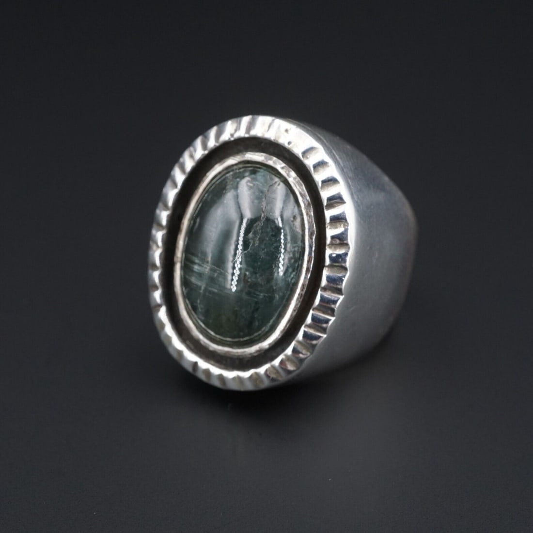 Chunky Sterling Silver Cabochon Candy Dome Blue Quartz Ring Size 8.75 RS3245: This domed candy ring features a large egg-shaped cabochon of beautiful translucent blue-green quartz, set in a shadowbox frame accented by a crimp textured bezel. All crafted of solid sterling silver