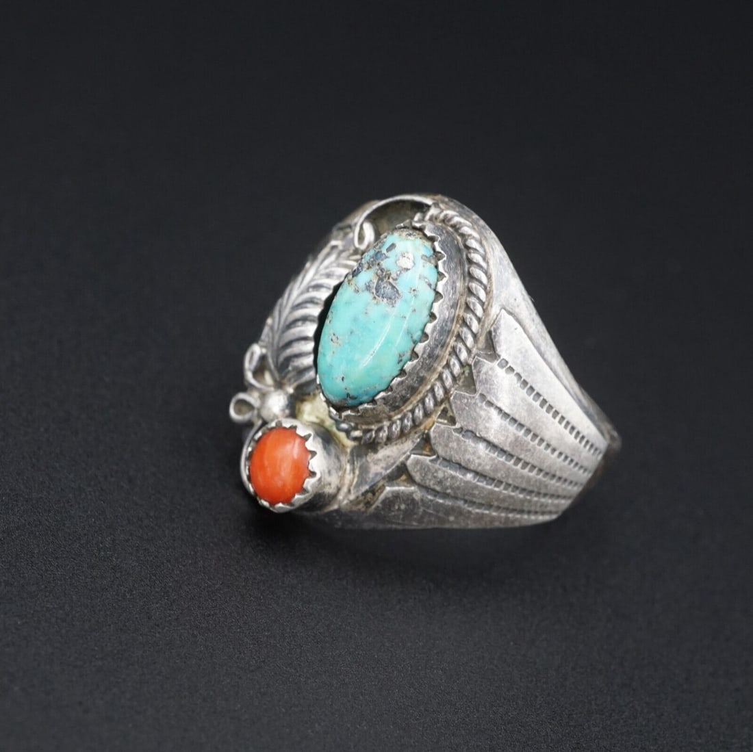 Navajo Oscar Alexius Sterling Silver Coral Turquoise Ring Size 10.25 RS3347: This beautiful Navajo ring features a gorgeous slab of bright blue turquoise, set in a classic bezel with a rope border embellished with silver beads. A great addition to any Native American jewelry c