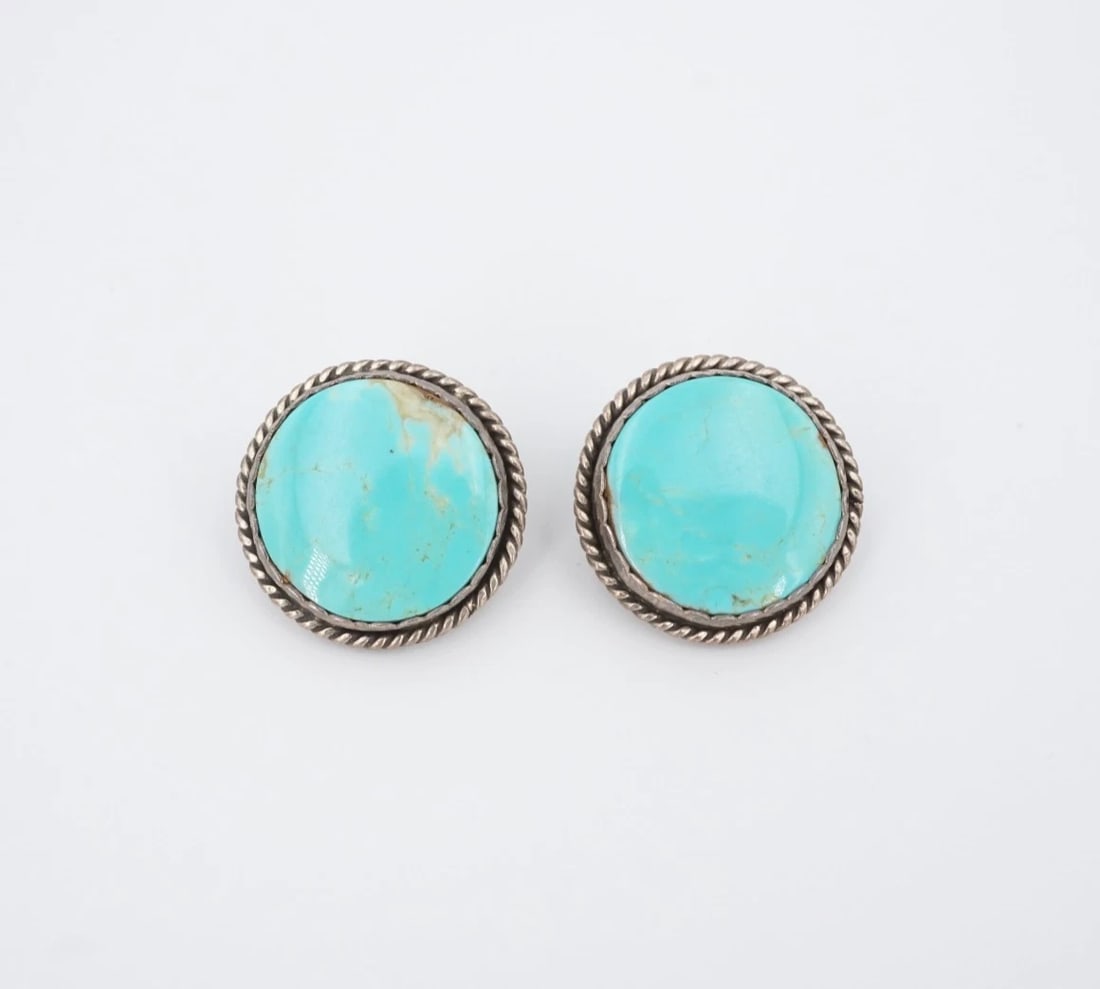 Joan Slifka Sterling Silver Natural Turquoise Stud Earrings 1" Vintage ES2855: These beautiful statement earrings from Joan Slifka feature a large blue turquoise cabochons framed in a sterling silver rope bezel. The earrings fasten securely with butterfly clasps. The bright and 