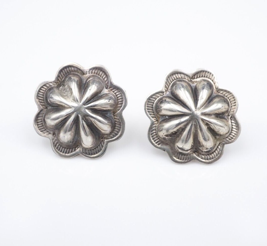 Vintage Southwestern Concho Stud Earrings Sterling Silver 0.84" Post ES2627: These gorgeous Native American earrings feature a classic concho design with a textured border set in solid sterling silver. The earrings fasten securely with sturdy butterfly backs. A wonderful Nativ