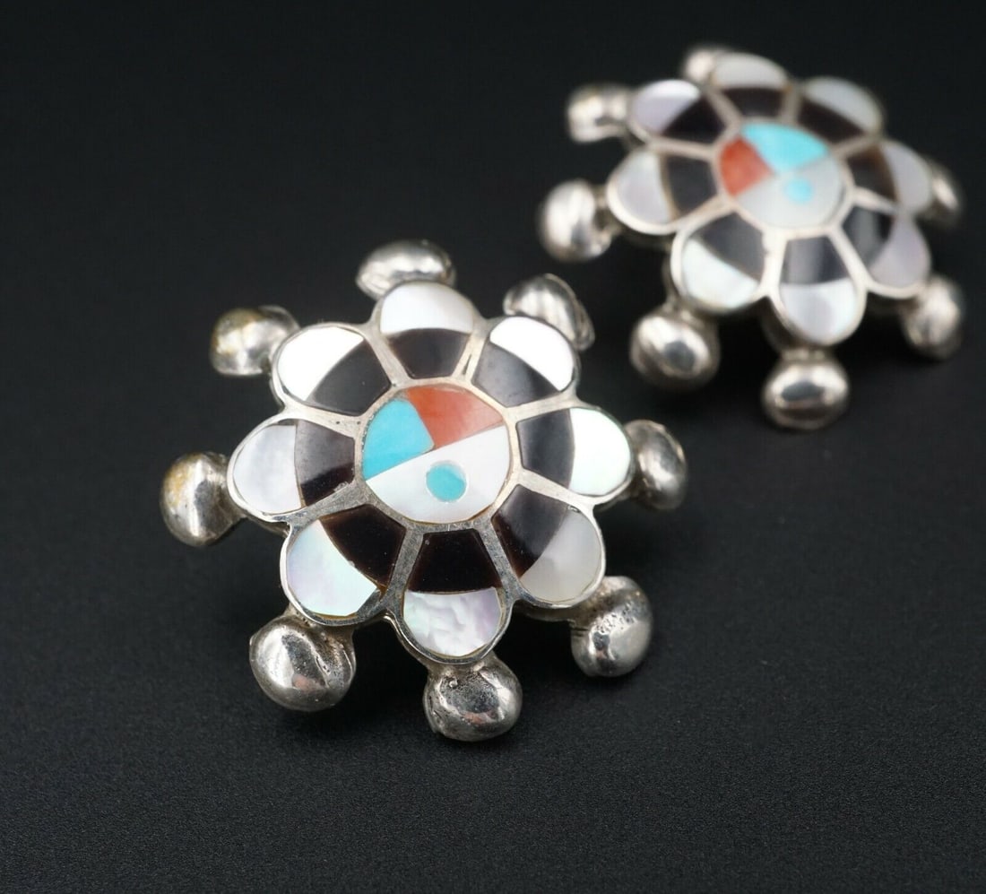 Zuni Sunface Inlay Earrings Sterling Silver Turquoise Pauline Lonjose ES2157: These unique vintage pair of earrings have a sun face inlay with sections of alternating turquoise, coral, onyx and shell insets into the face of each earring. Additional sterling silver bead accents 