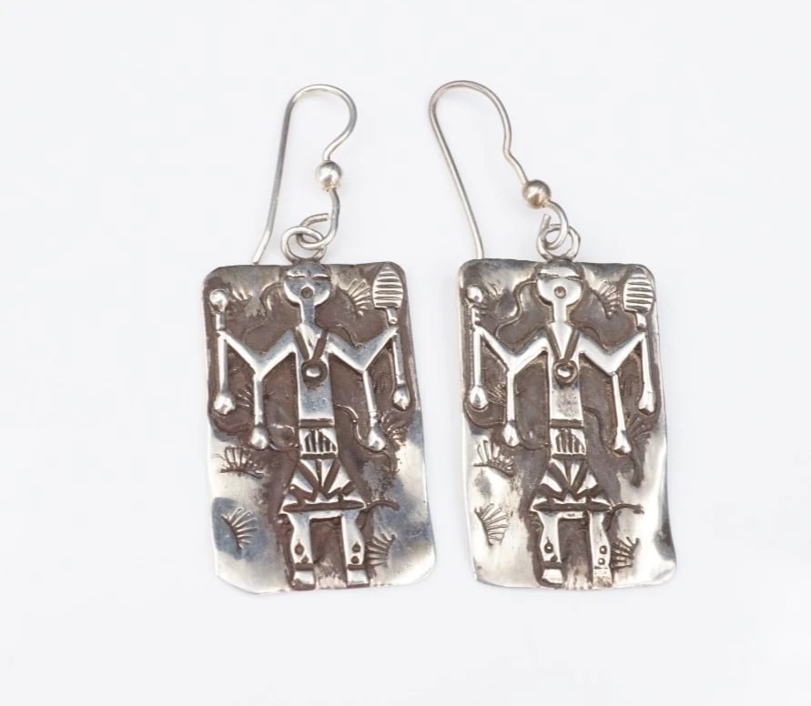 Navajo Medicine Woman Dangle Earrings Sterling Silver 2" Fernando Benally ES2816: These Navajo artisan earrings each feature a detailed sterling silver medicine woman design. The earrings secure with sturdy hooks for pierced ears. With intricate overlay and stamped designs, these s