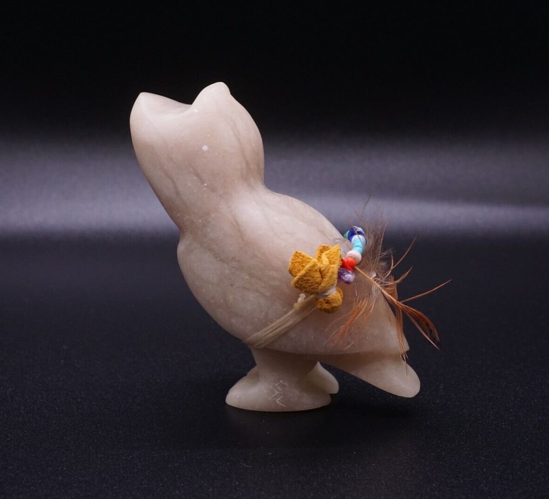 Zuni Carved Fetish Owl Alabaster Stone Feather 2.5" Artisan M1900: This unique vintage fetish features beautiful alabaster stone carved into the shape of an intricate owl. Tied around the center is a yellow medicine bundle adorned with a feather and multiple gemstone