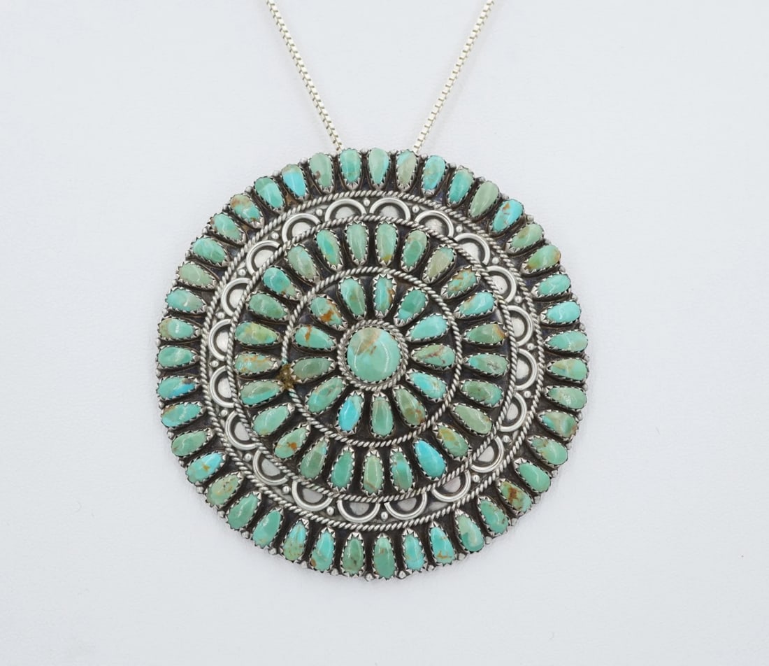 Larry Moses Begay Turquoise Sterling Petit Point Pendant Brooch LMB 2.6" OS707: This beautiful Navajo petit point brooch from Larry Moses Begay features beautiful blue-green turquoise cabochons bezel-set in a large sterling silver frame. It comes with a supple sterling silver box