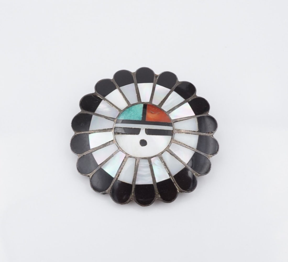 Laahty Zuni Sunface MOP Coral Turquoise Pendant Brooch Sterling Silver 2?? OS660: This beautiful pendant is crafted by Morris and Sadie Laahty, with onyx, mother of pearl, coral, and turquoise set in a sunface design, and crafted entirely of sterling silver. This piece can be worn 
