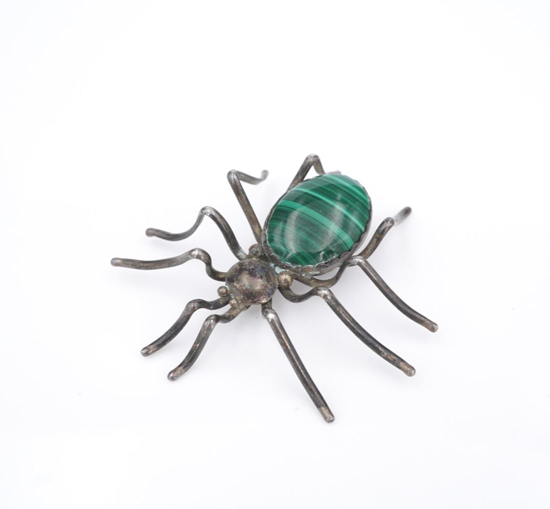 Navajo Malachite Spider Brooch Pin Sterling Silver Esther Spencer 2.2" OS665: This incredible brooch from Navajo artisan Esther Spencer features a 3D spider design crafted of solid sterling silver with a vivid green malachite cabochon bezel set on the thorax. This gorgeous piec