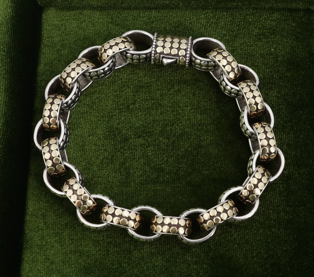 John Hardy Icon Dot Oval Link Bracelet 18k Gold Sterling Silver 8" BS3303: This classic bracelet from John Hardy features a thick oval link design with Icon Dot gold and sterling dot accents, finished with an Icon dot 18k gold style clasp. Crafted in solid sterling silver. M