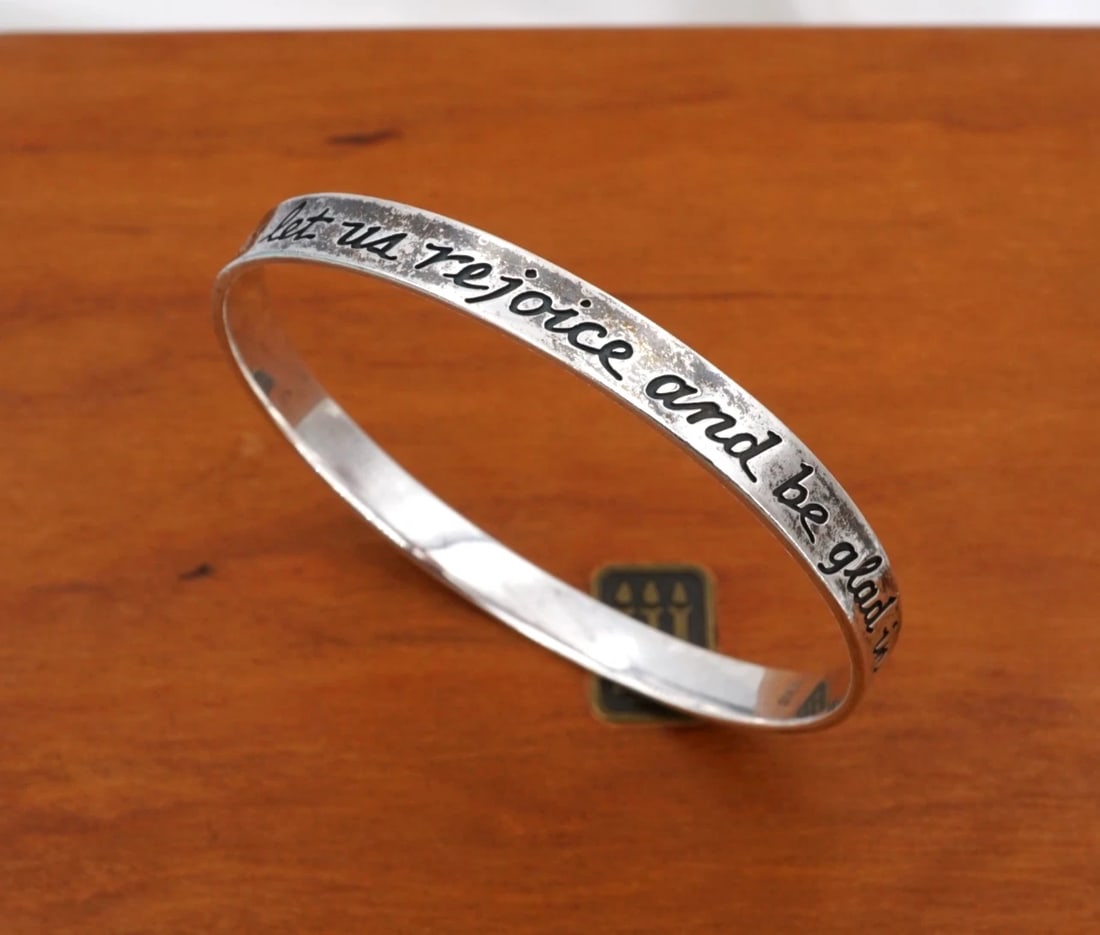 James Avery This is the Day Bangle Bracelet Sterling Silver 7.5" Retired BS3343: This retired James Avery bracelet features a chunky sterling silver bangle embellished with an engraved scripture from Psalm 118:24 which reads "This is the day the Lord has made, or for stacking with