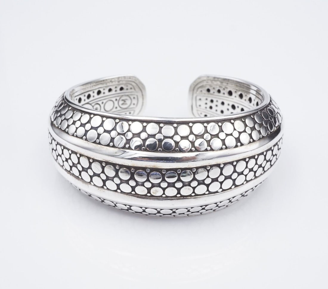 John Hardy 34mm Wide Armadillo Dot Kick Cuff Bracelet Sterling Silver BS2941: This classic designer bracelet features Hardy's iconic dot design, crafted in sterling silver, with a kick cuff design for ease of use. This bracelet is the extra wide version of the widely available 