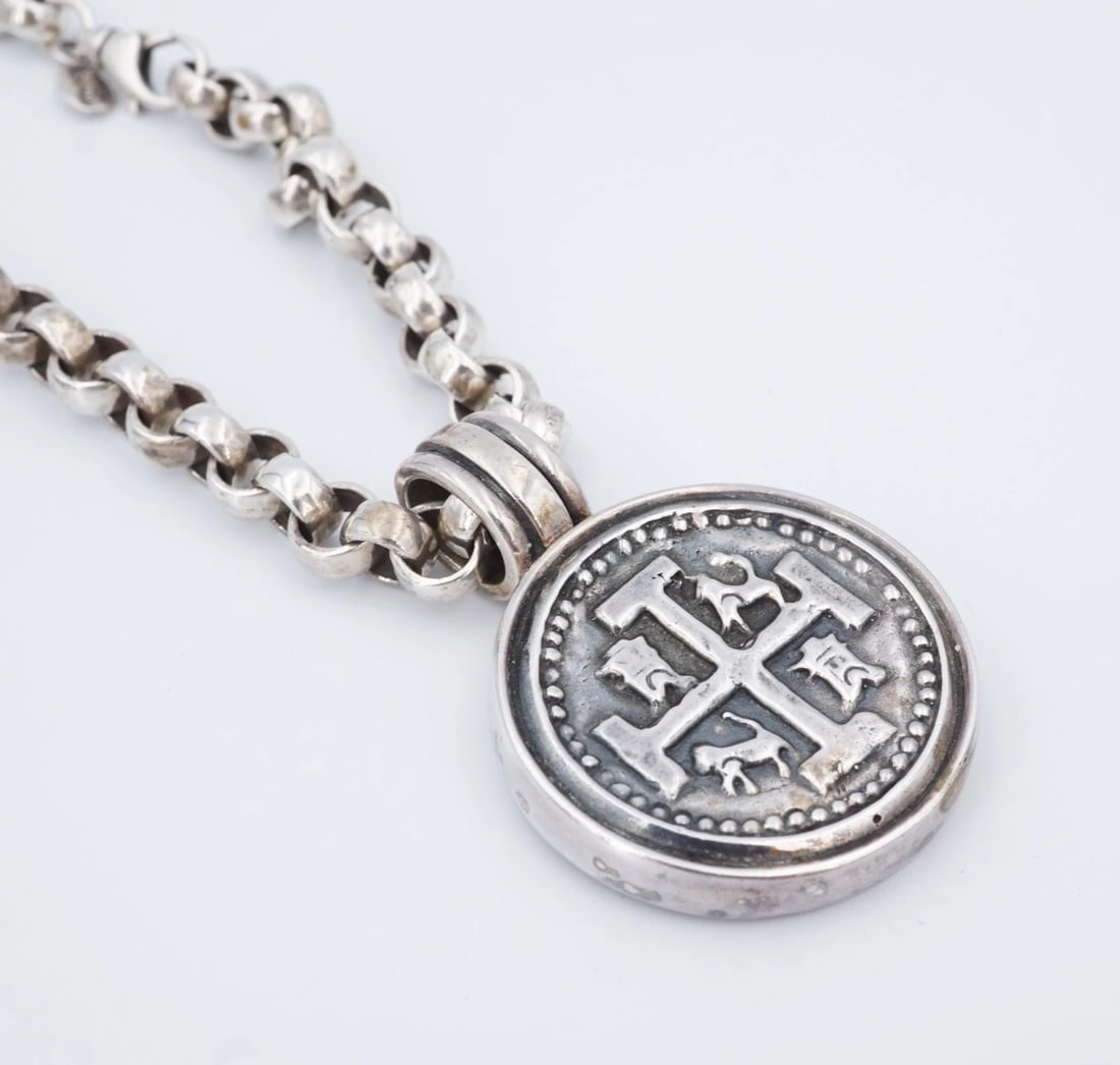Ned Bowman Sterling Silver Reales Style Coin Pendant Necklace 7mm Chain NS2440: Inspired by the Spanish reales coins from the Atocha, this sculptural sterling silver pendant necklace represents adventure and fortune. A statement piece that carries centuries of cultural richness i