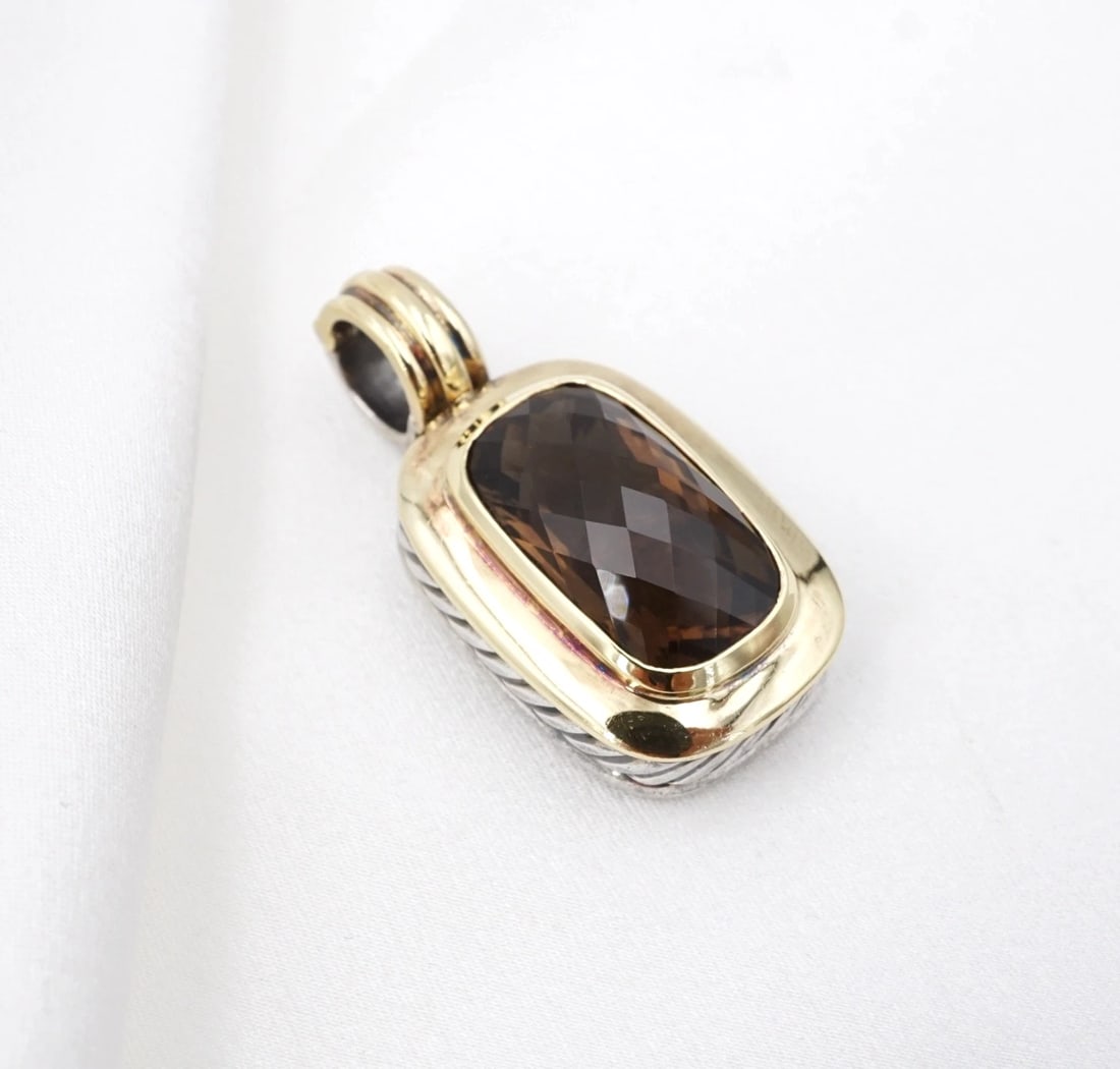 David Yurman Albion Pendant Enhancer 18k Sterling Silver 18mm Elongated PS2438: This enhancer pendant from David Yurman features an elongated smoky quartz gemstone bezel set in a 18k yellow gold bezel. The back of the pendant is crafted in sterling silver with a cable texture and