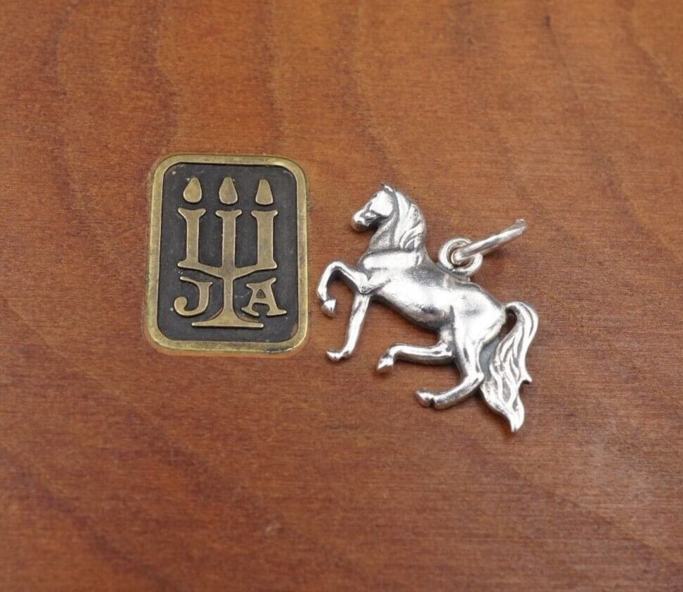 James Avery Running Prancing Horse 3D Sterling Silver 3/4" Rare Retired CHS1877: This charm is a rare, retired James Avery design. It features a detailed prancing horse, crafted of sterling silver. Metal Type: Sterling Silver (marked and tested) Notable Marks: James Avery Hallmark