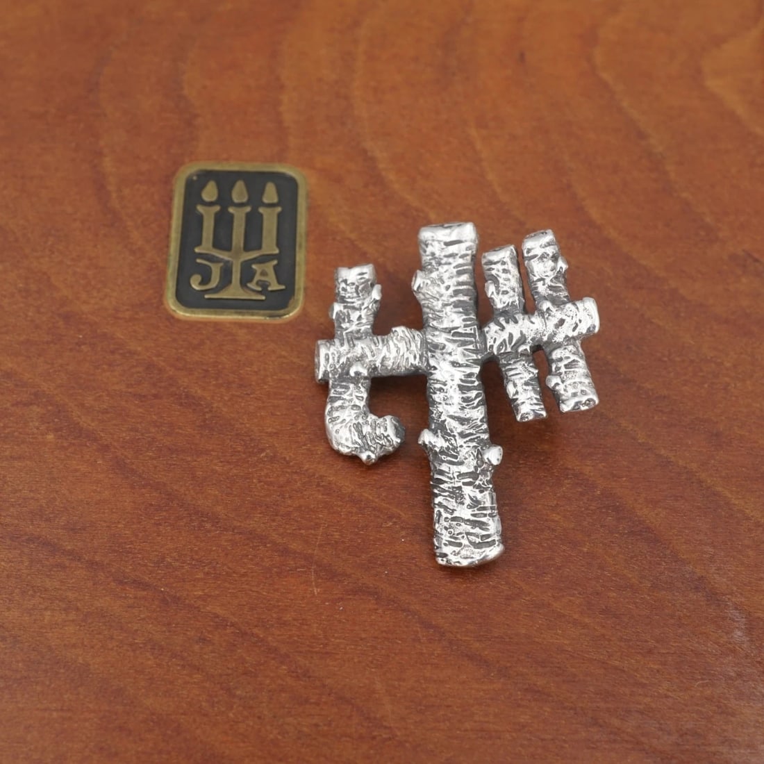 James Avery Lutherhill Camp Pendant Sterling Silver 0.9" Rare Retired PS2273: This retired James Avery Lutherhill camp charm features a classic, sterling silver cross design embellished with the letters "L" and "H" on either arm. Metal Type: Sterling Silver Notable Marks: JA Ha