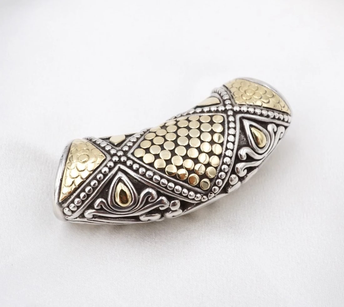John Hardy Fleur De Lis Dot Tube Slide Pendant Sterling Silver 18k 0.94" PS2426: This slide pendant from John Hardy features a curved, sterling silver tube shape decorated with 18k yellow gold dots, fleur de lis motifs and filigree scroll designs. Metal Type: Sterling Silver and 1
