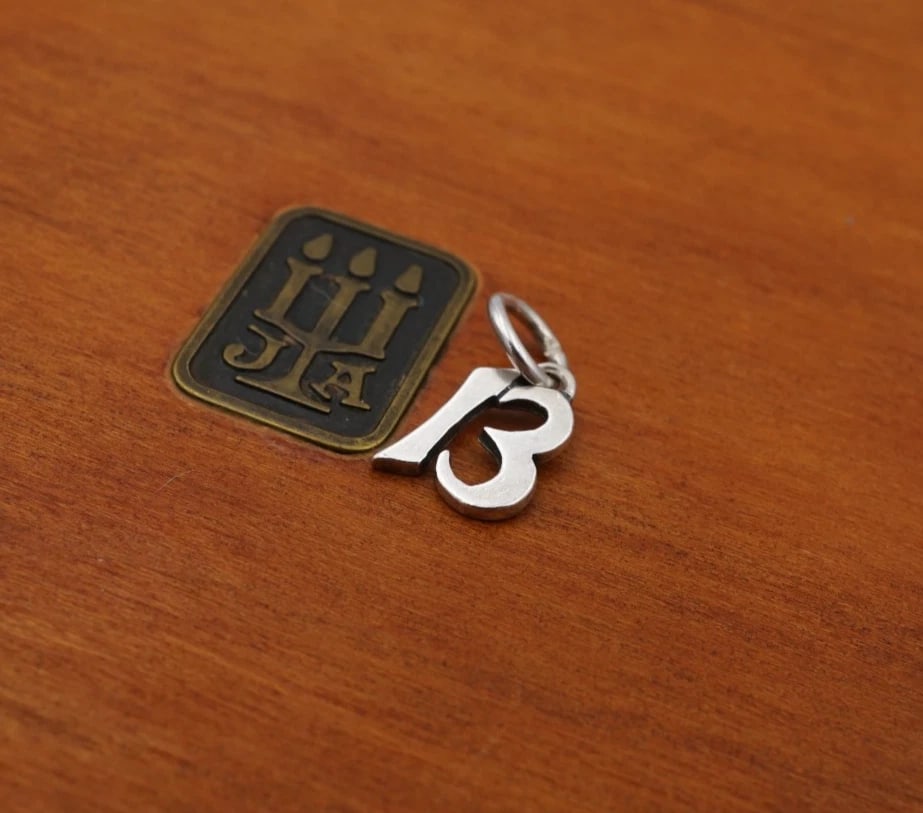 Vtg James Avery Lucky Number 13 Charm Pendant Sterling Silver Retired CHS2392: This James Avery charm features the number 13 in a stylized font, crafted of sterling silver. Metal Type: Sterling Silver Notable Marks: Avery Ster Measurements: 11/20"; 0.51 grams Condition: Very goo