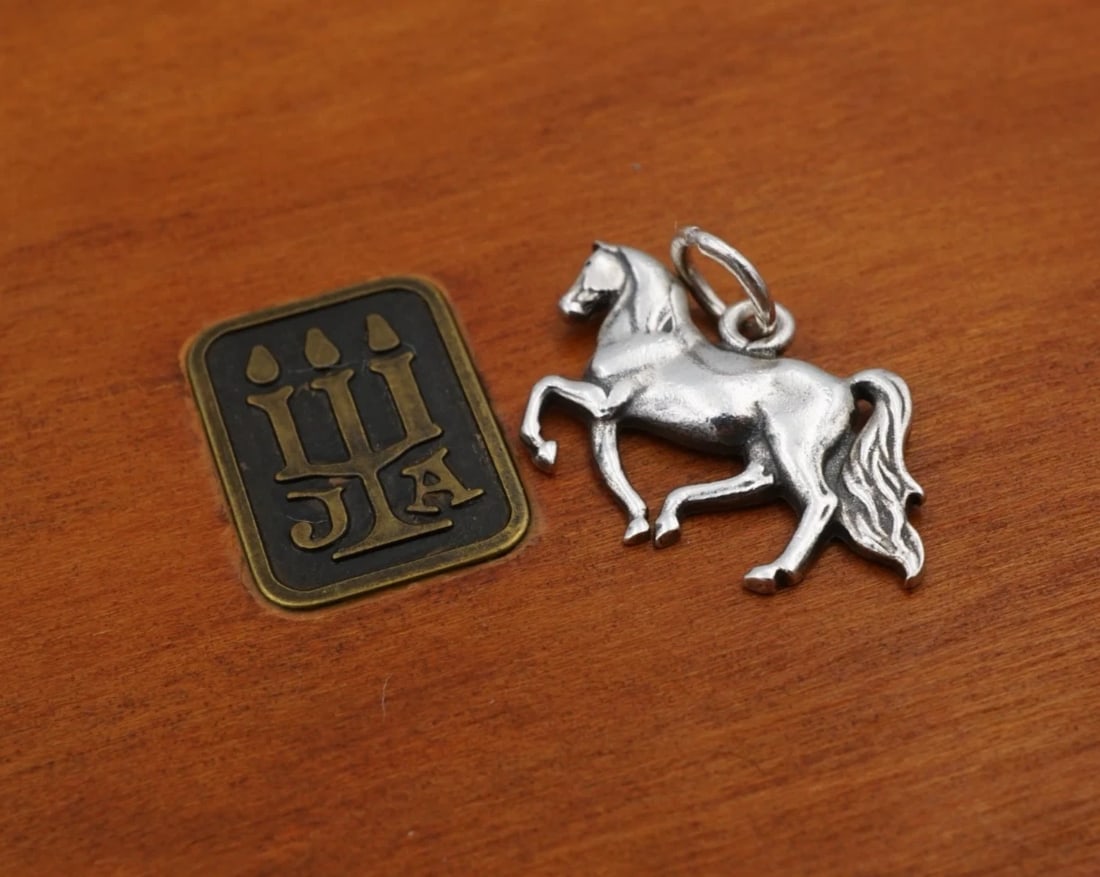 James Avery Running Prancing Horse 3D Sterling Silver 3/4" Rare Retired CHS2391: This charm is a rare, retired James Avery design. It features a detailed prancing horse, crafted of sterling silver. Metal Type: Sterling Silver Notable Marks: JA Hallmark 925 STER Measurements: 3/4" 