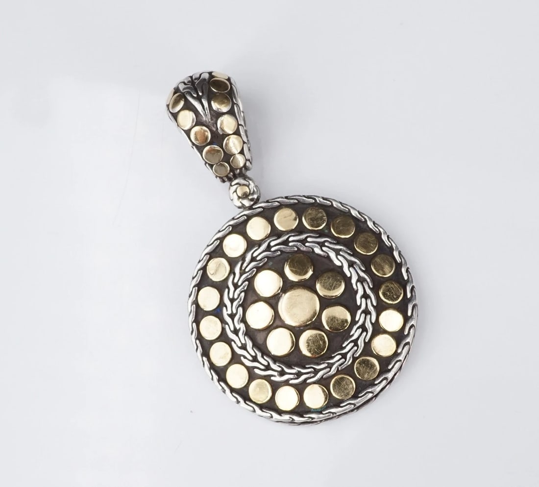 John Hardy Sterling Silver 18k Yellow Gold Dot Round Pendant 1.8" PS2359: This pendant from John Hardy features a tapered bale articulated atop a large disc, crafted of sterling silver and decorated with 18k yellow gold dots. Metal Type: Sterling Silver and 18k Yellow Gold 