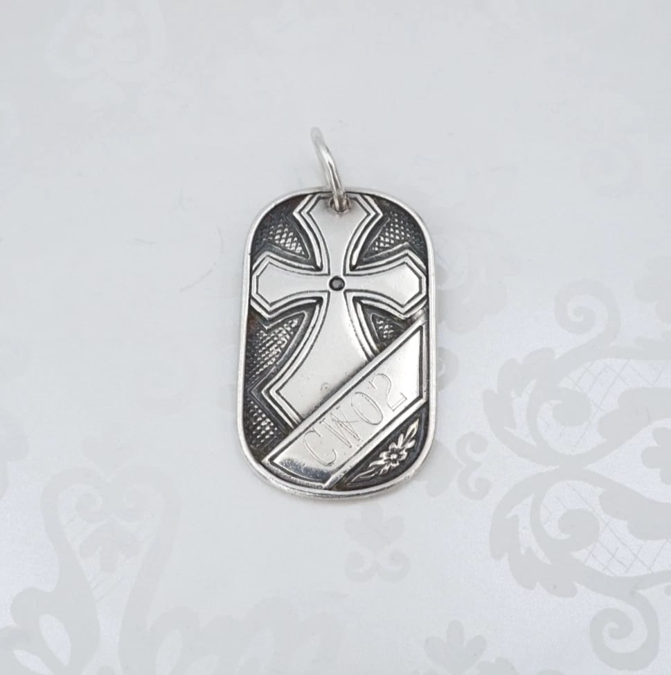 Konstantino Celtic Cross Dog Tag Pendant Necklace Sterling Silver 1.9" PS2266: This retired pendant from Konstantino features a classic sterling silver dog tag pendant embellished with an ornate Celtic cross design atop a textured background. This pendant is a classic design. Me