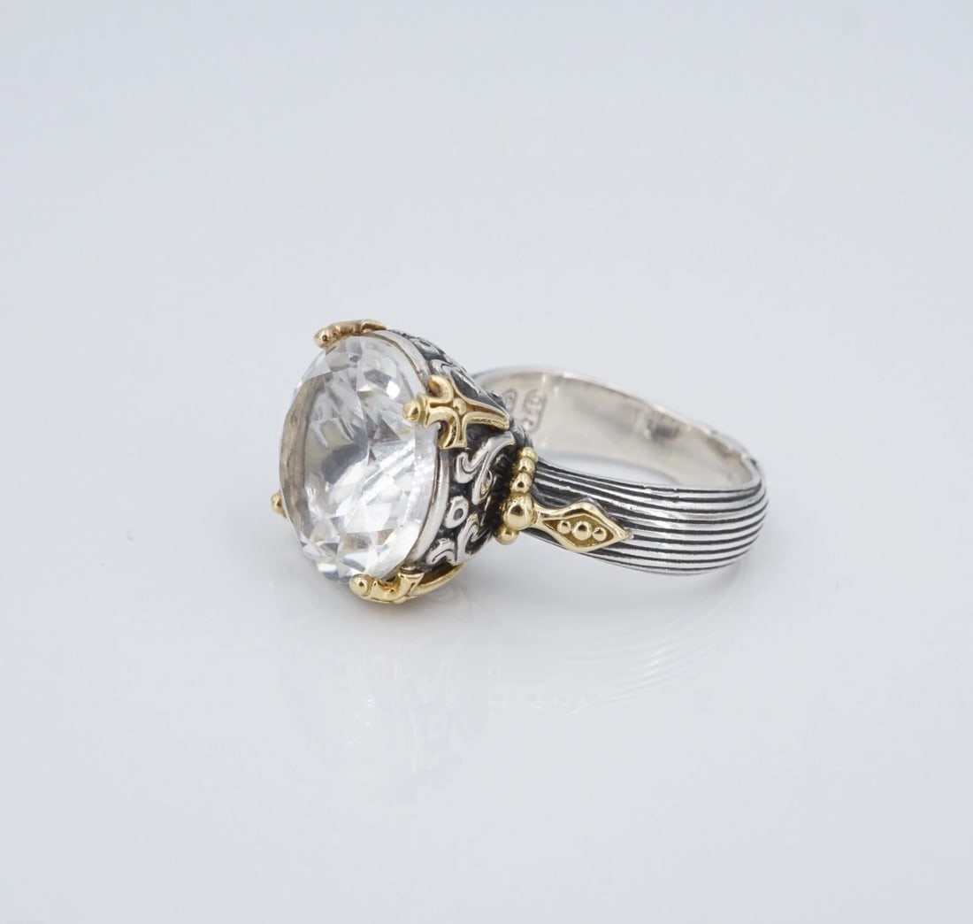 Konstantino Rock Crystal Clarity Ring Sterling Silver 18k Gold Size 7 RS3924: This classic Konstantino "Clarity" ring features a large round cut rock crystal gemstone set in an ornate filigree basket with 18k gold prongs. Set atop a wide sterling silver band with a pinstripe te