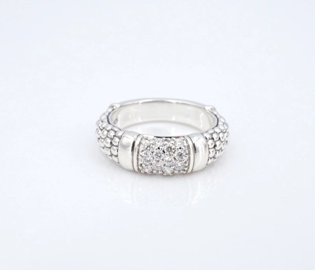 Lagos Signature Caviar Natural Pave Diamond Ring Sterling Silver 4mm Sz 7 RS3922: This Lagos "Signature Caviar Diamond" ring features a bed of natural round diamonds pave set in the center of a chunky sterling silver band with a beaded design on either shoulder. Style # 02-80753-DD
