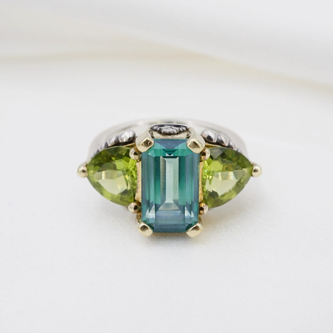 Lagos Caviar Glacier Ring Topaz Peridot Sterling Silver 18k Gold Size 7 RS4062: This statement Lagos Caviar ring from their "Glacier" collection features a chunky construction with large colorful gemstones set in a combination of sterling silver and 18k yellow gold. With ornate b