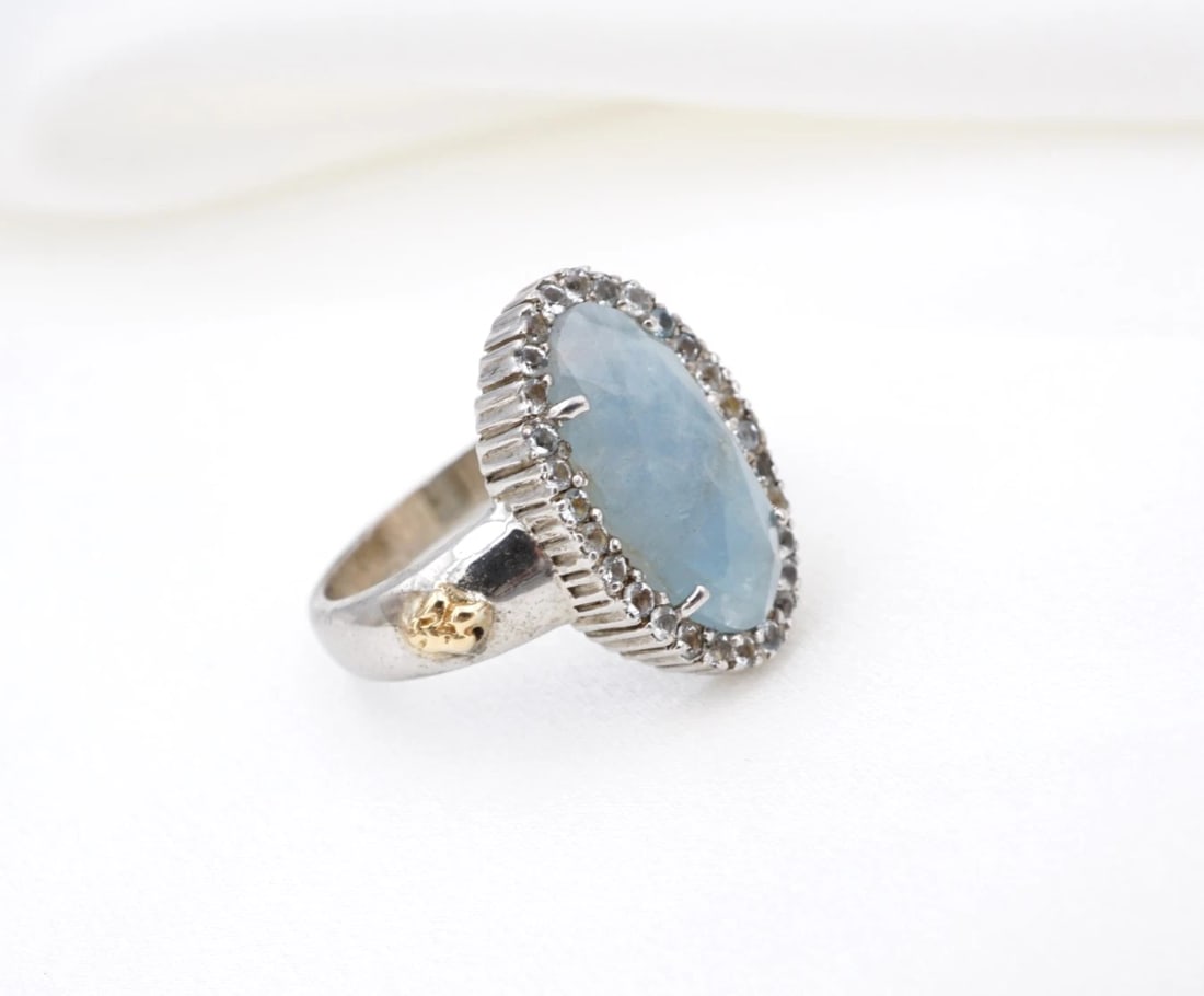 Phillip Gavriel Milky Aquamarine Rock Candy Ring Sterling 18k Gold 8.25 RS4071: This Rock Candy ring from designer Phillip Gavriel centers on an oval-cut milky aquamarine gemstone framed by a halo of round aquamarine accents, all set in a solid sterling silver mount with 18k gold