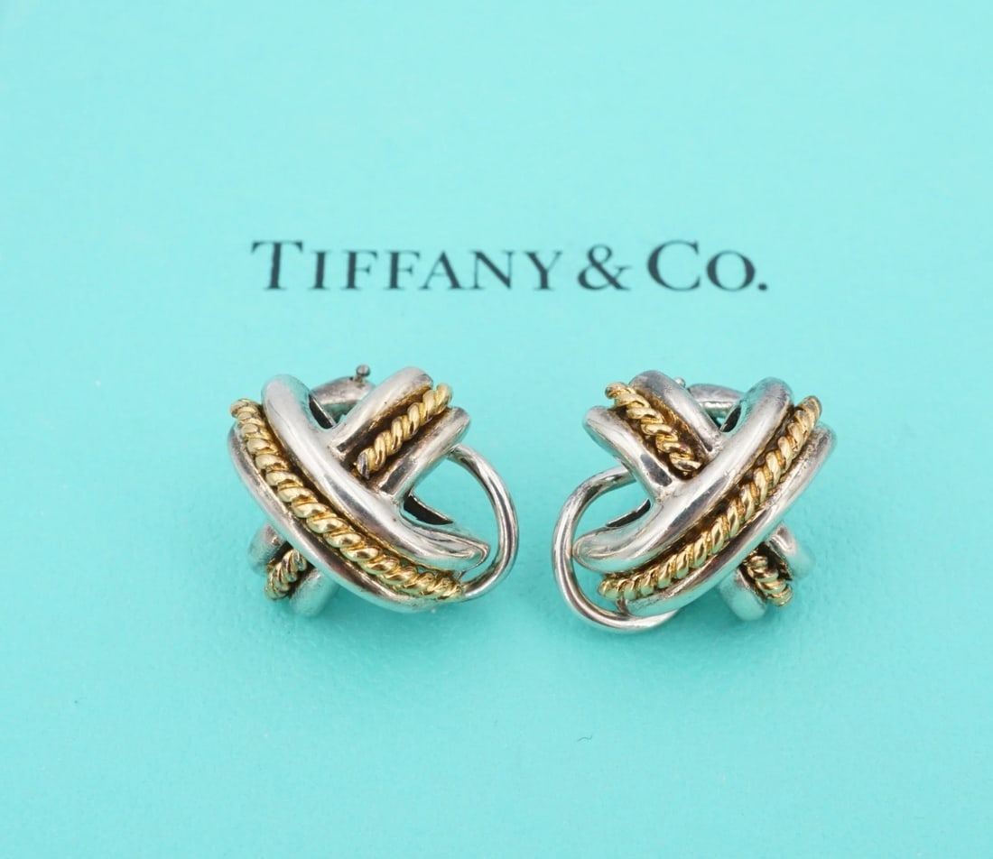 Tiffany Signature X Earrings Sterling Silver 18k Yellow Gold Ear Clip ES2891: These Tiffany & Co. Signature X ear-clips are crafted of solid sterling silver with 18k yellow gold roped accents. Secure clip backs provide a secure fit. Posts can be added for pierced ears. Metal Ty