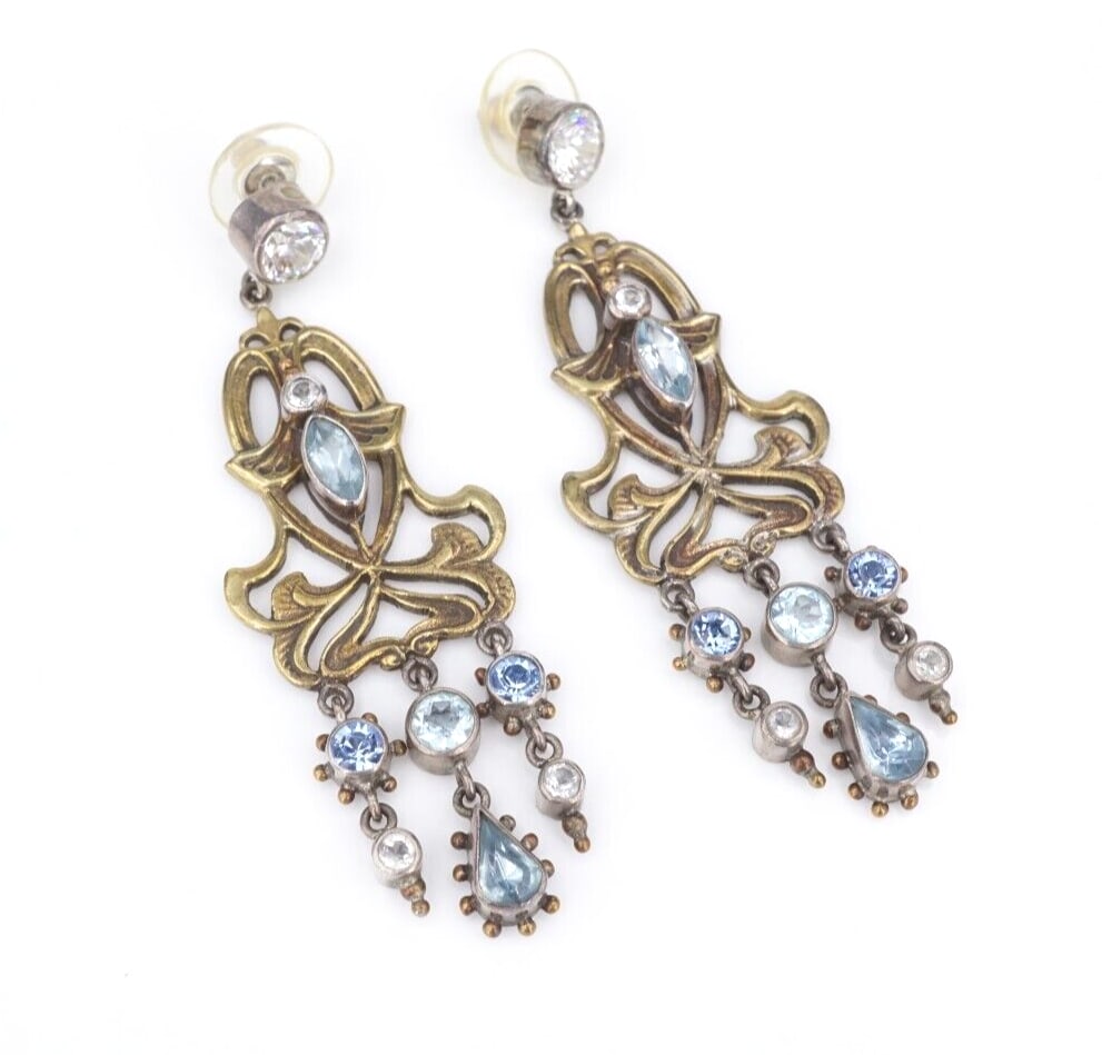 Mars & Valentine Earrings Sterling Silver Topaz Crystal Dangle Drop 2.7" ES2501: These earrings by designer Mars & Valentine, features chandelier style blue topaz and white crystal accents. Crafted in sterling silver. These statement earrings would make a great addition for any je