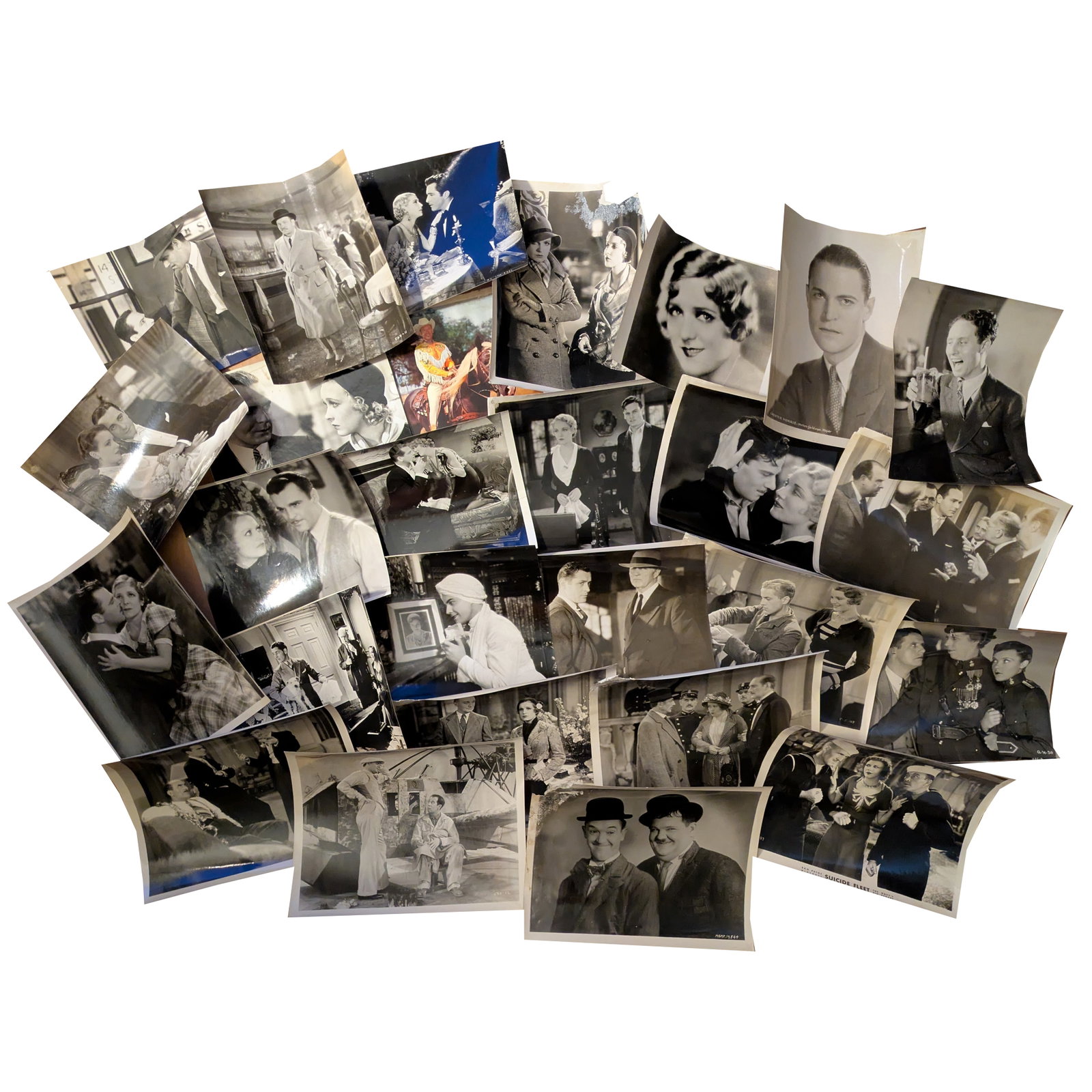Group of (27) Original Pre-Code 1930s 8x10 Stills: Joan Crawford, Ramon Novarro, Mary Pickford: Collection of 27 original 8"x10" black and white film stills from early 1930s pre-code Hollywood productions. Stars pictured include Laurel and Hardy, Wallace Beery, Joan Crawford, Mary Pickford, Ramo