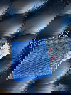 Judith Leiber Sapphire Clutch: Judith Leiber Sapphire Clutch. Indulge in timeless elegance with the Judith Leiber Sapphire Clutch, a luxurious accessory that effortlessly elevates any evening ensemble. Renowned for its exquisite cr