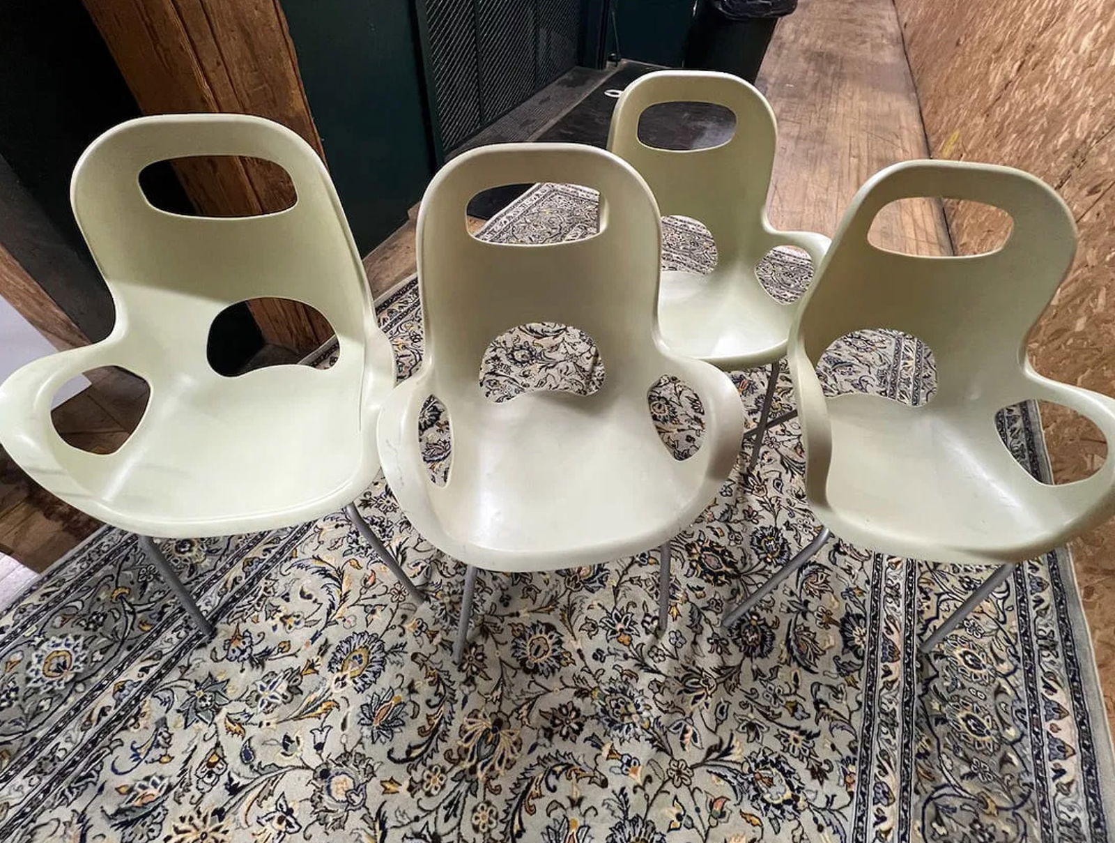 Vintage Umbra Oh Pearlescent Arm Chair Set (4 total): Vintage Umbra Oh Pearlescent Arm Chair (4 total). Add a touch of modern luxury and vintage charm to your space with this Vintage Umbra Oh Pearlescent Arm Chair Set. Featuring a sleek, sculptural desig