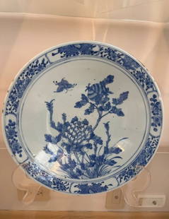 Antique Blue/White Chinese Qing Dynasty (1644-1911) porcelain Platter 12" diameter: Antique Blue/White Chinese Qing Dynasty (1644-1911) porcelain Platter 12" diameterPorcelain with underglaze cobalt blueFloral motifs with large peony or lotus and butterfly. The rim has decorative bor
