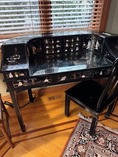 Mother of Pearl Inlay Desk: Black laquer painted and semiprecious stone and mother of pearl inlay desk. Bring timeless beauty and craftsmanship into your workspace with this Mother of Pearl Inlay Desk. Featuring intricate inlays
