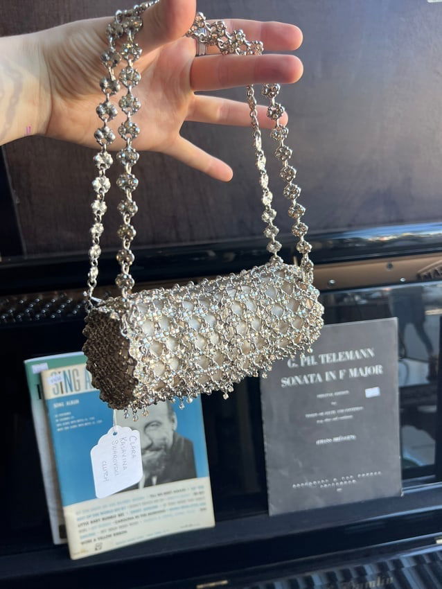 Clara Kasavina Swarovski Clutch: Clara Kasavina Swarovski Clutch. Elevate your evening attire with the Clara Kasavina Swarovski Clutch, a dazzling work of art that embodies luxury and elegance. Adorned with sparkling Swarovski
