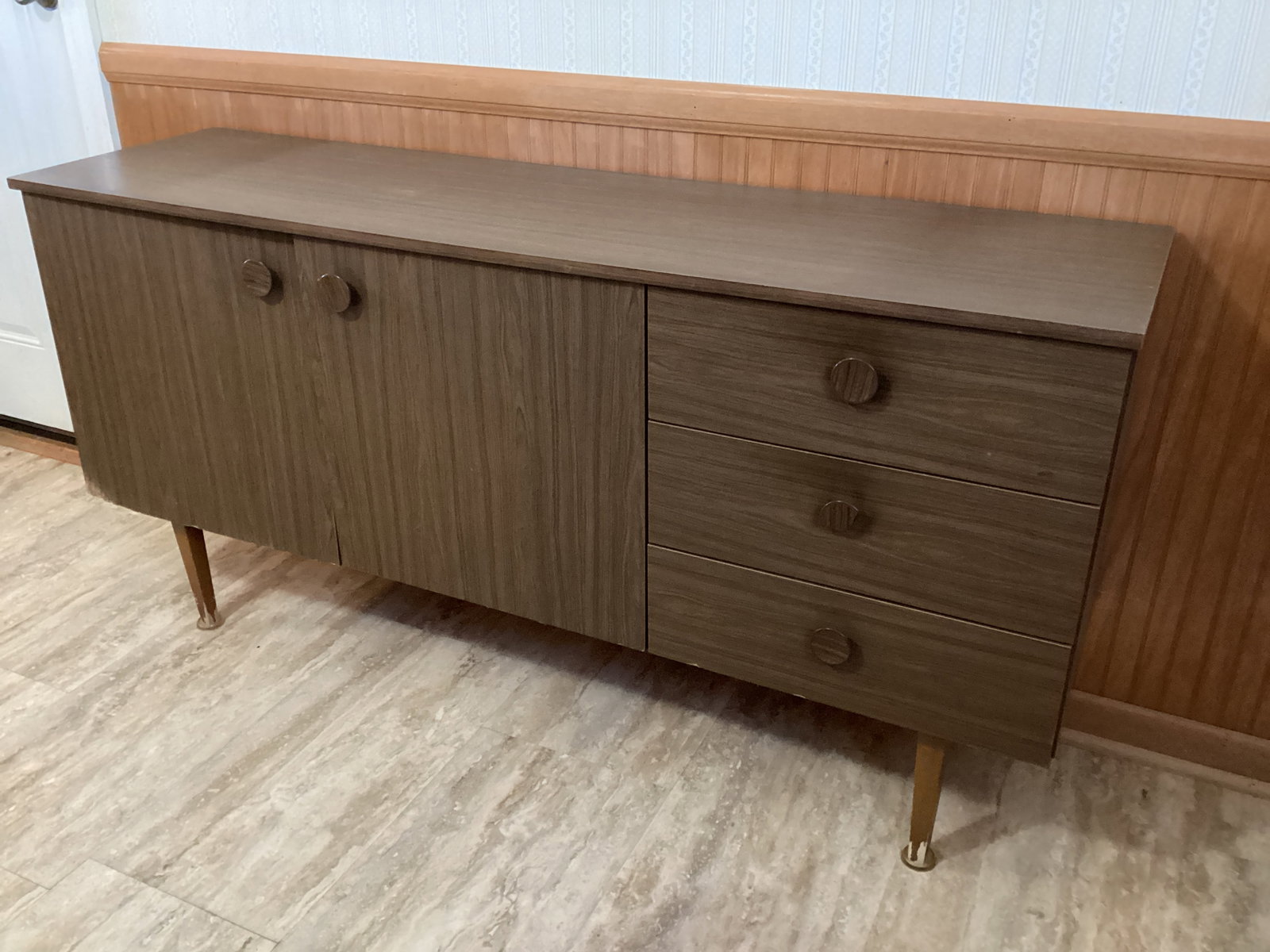 Sideboard Cabinet: Damage on bottom corner of door, door needs to be adjusted, wear to finish on legs, 58 1/2" w x 16" d x 29 1/2" h, shipping unavailable for this lot