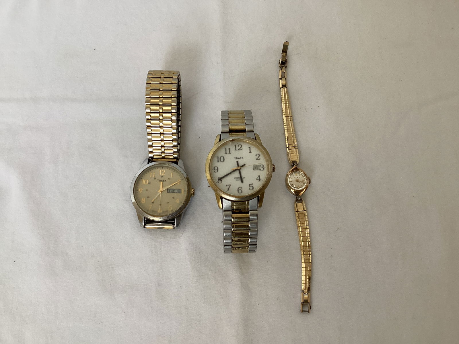 Two Men's Timex Watches and Ladies' Elgin Watch: both Timex watches working