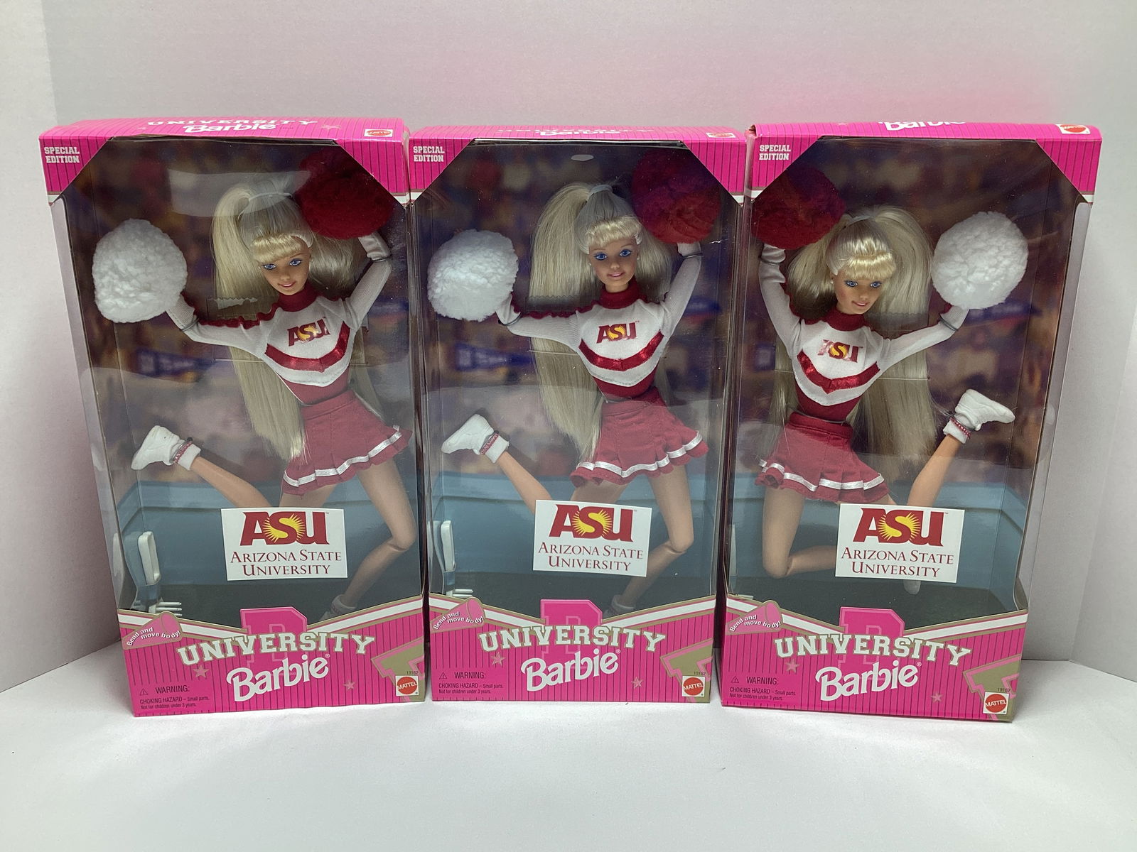 Three Arizona State University Barbie Dolls (1 of 6)