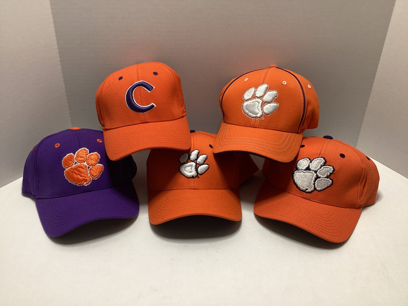 Five Clemson Tigers Fitted Hats: .
