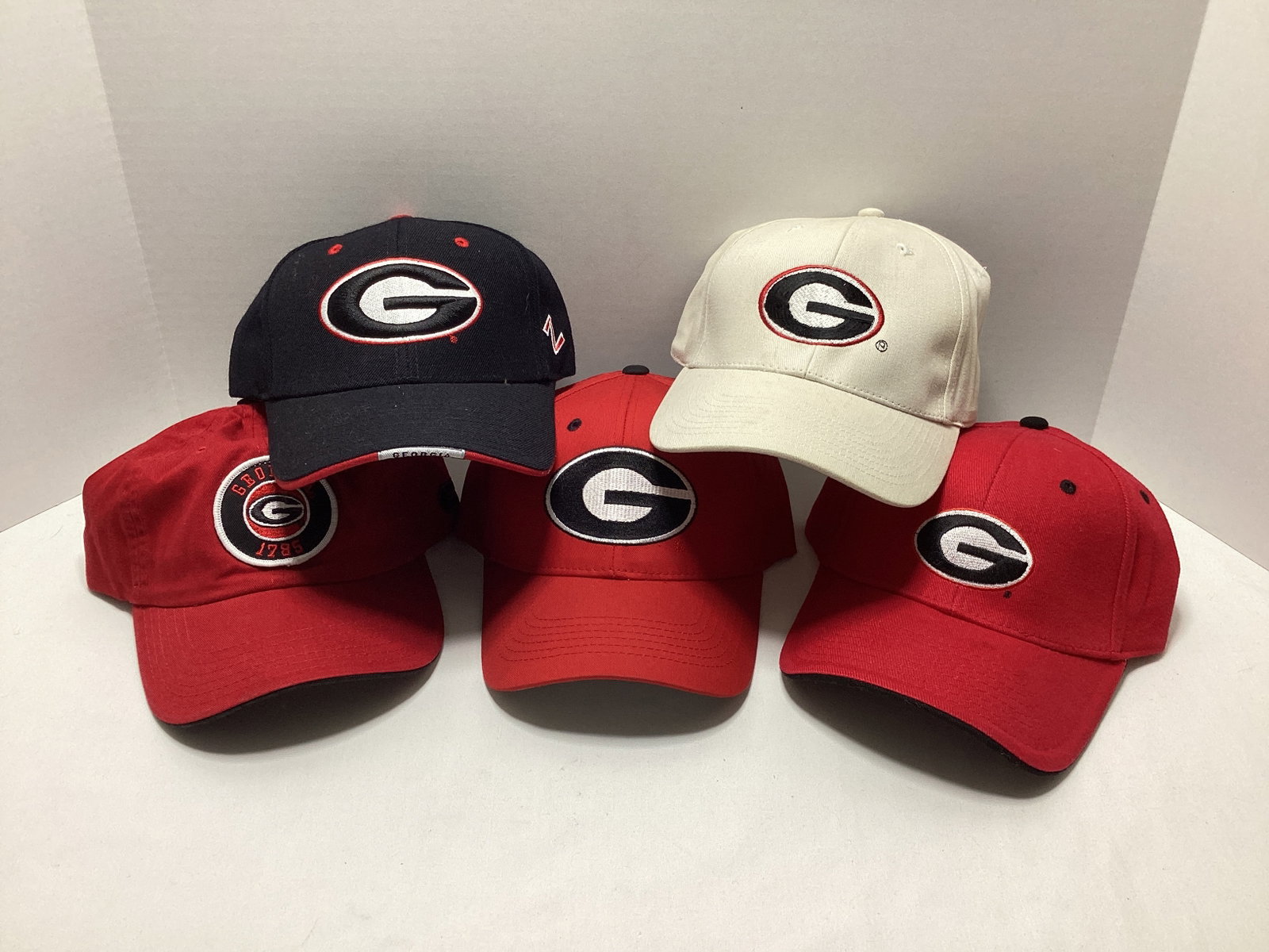 Five Georgia Bulldogs Hats: .