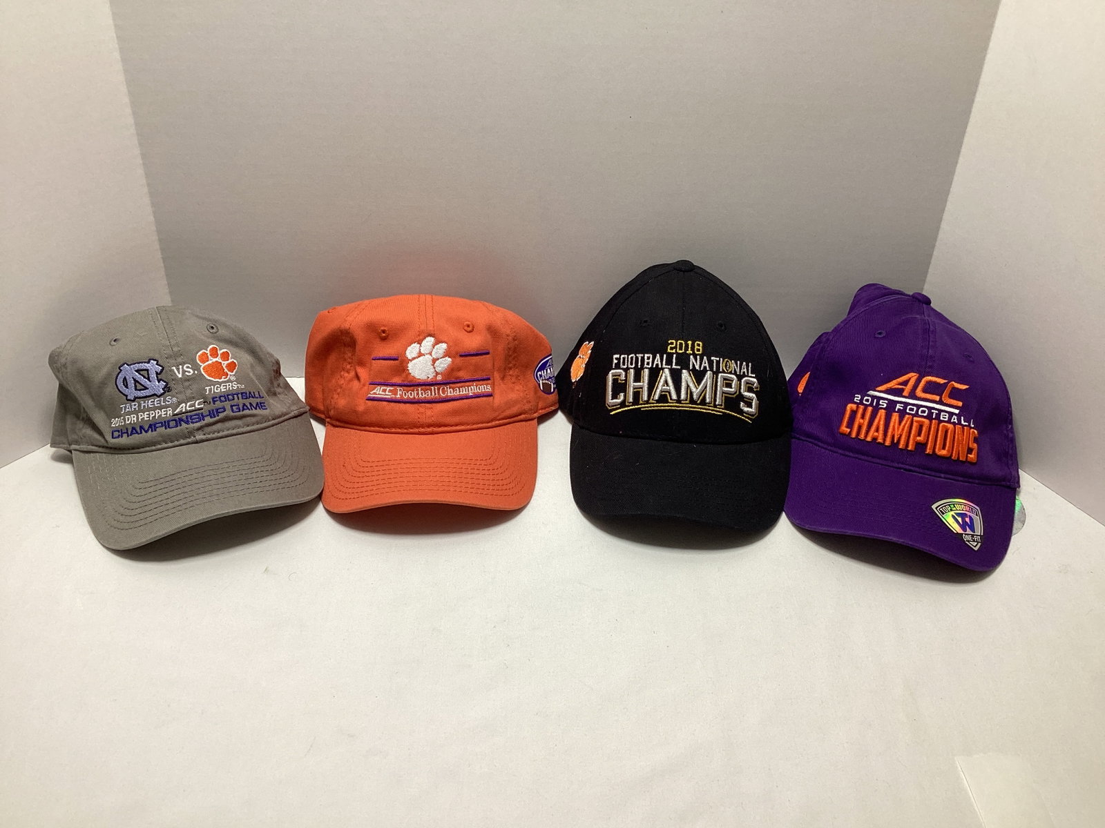 Four Clemson Tigers Football Championship Hats: .