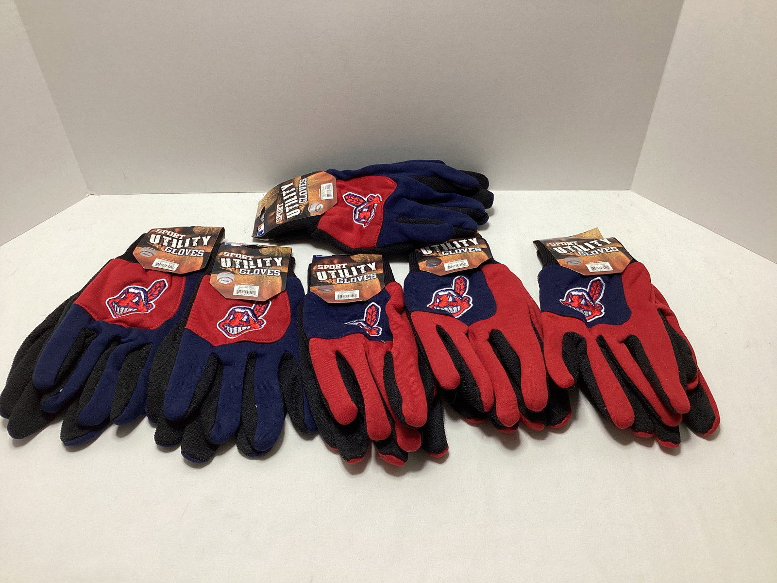 Six Pairs of Cleveland Indians Utility Gloves: .