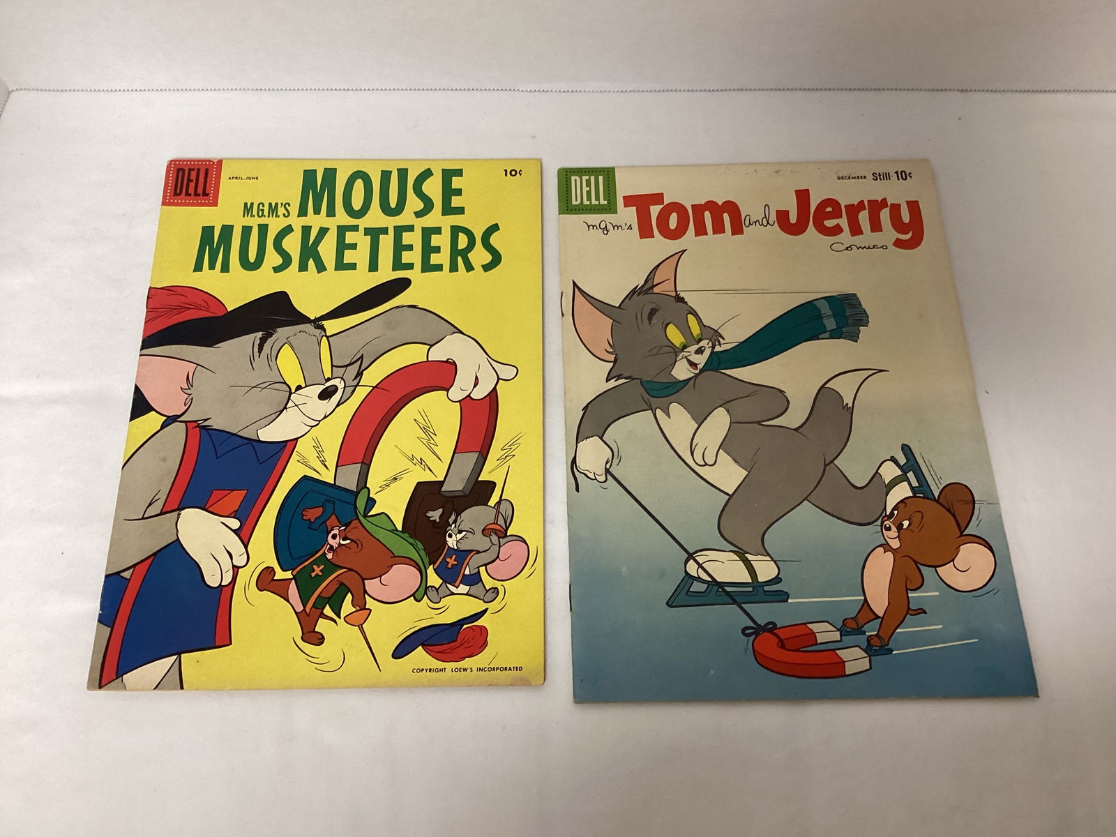 Two Tom and Jerry Dell Comic Books: Mouse Musketeers 8 and Tom and Jerry 173, Please preview and see all photos for condition