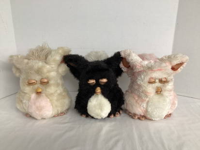 Three Tiger Electronics Furby Toys: untested, need cleaning, one has a broken foot, 8" h