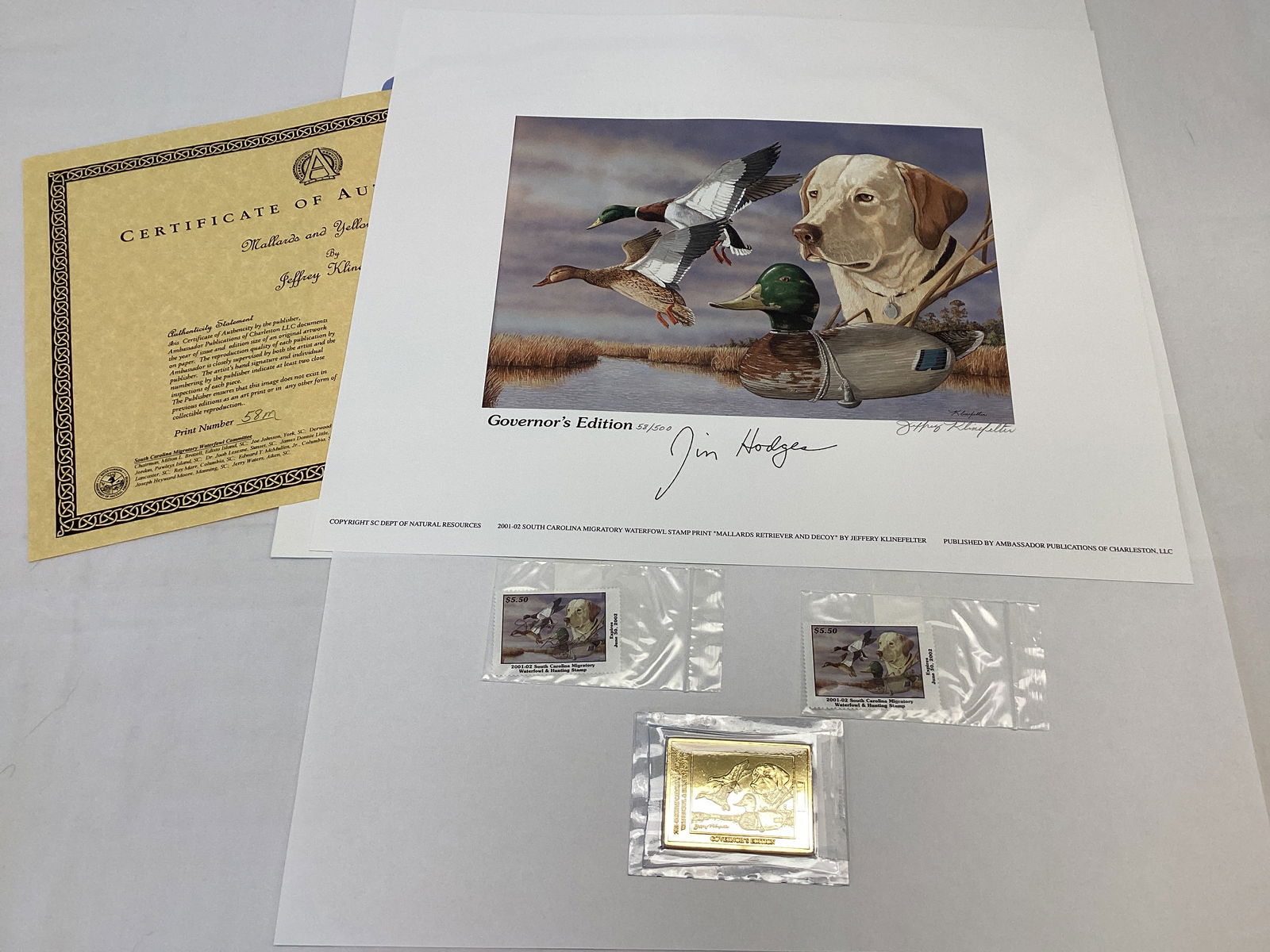 2001 South Carolina Governors Edition Duck Stamp and Print: 14" x 12", 58/500, Governors Medallion, Mallards and Yellow Lab, signed by Governor Jim Hodges and artist Jeffery Klinefelter, one stamp signed