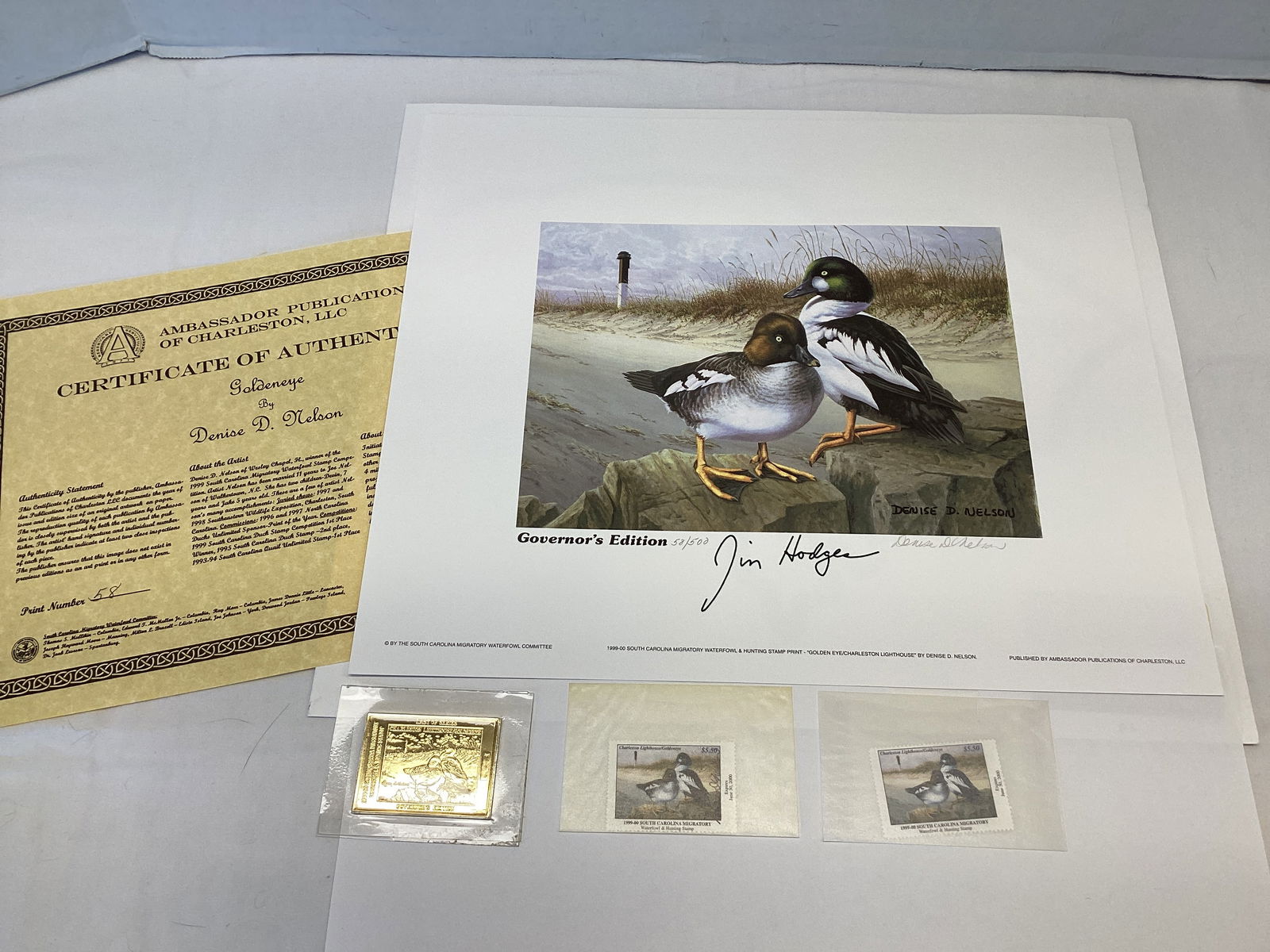 1999 South Carolina Governors Edition Duck Stamp and Print: 14" x 12", 58/500, Governors Medallion, Golden Eye/Charleston Lighthouse, signed by Governor Jim Hodges and artist Denise Nelson, one stamp signed