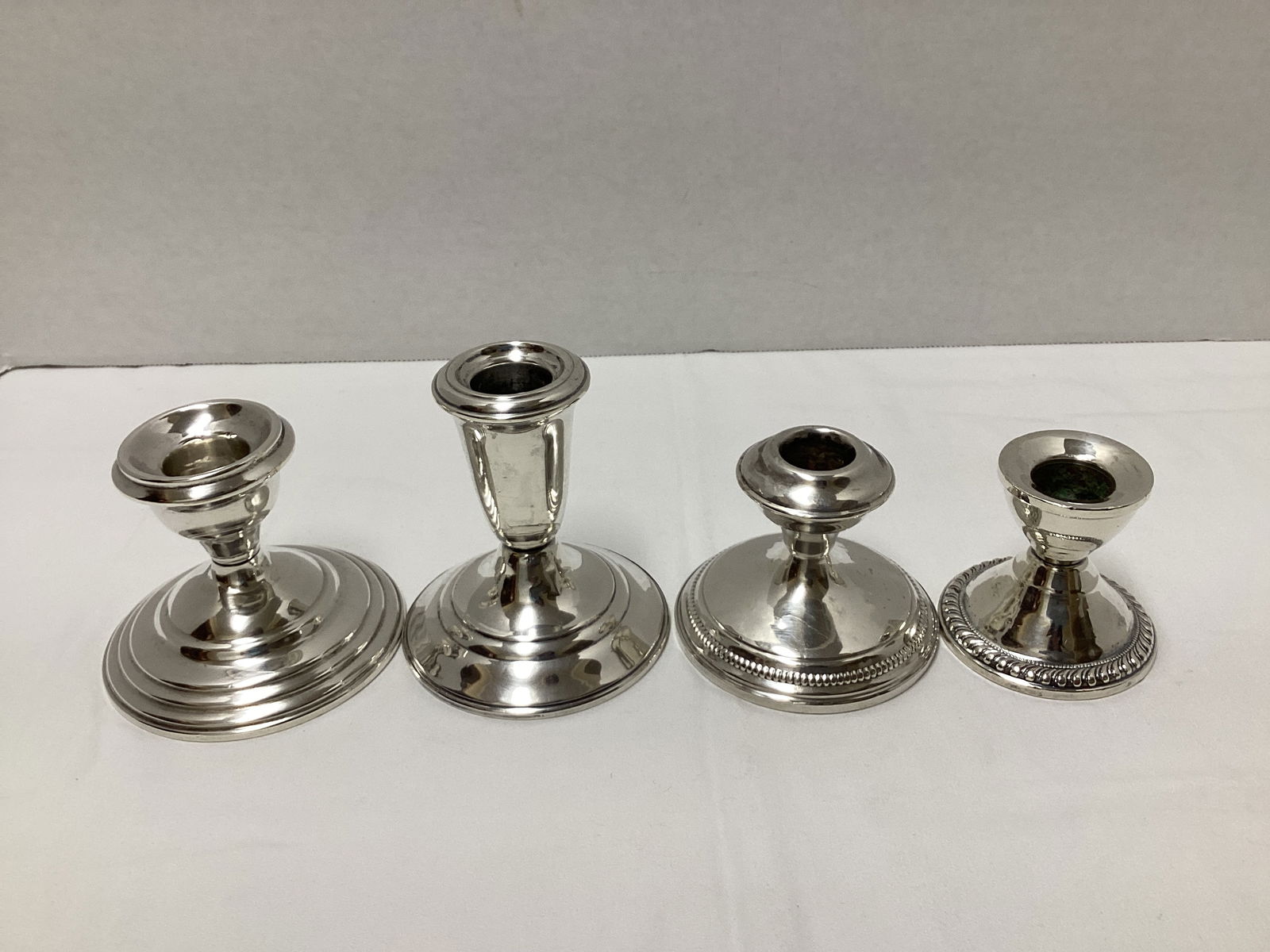Four Sterling Weighted Candlesticks (1 of 17)