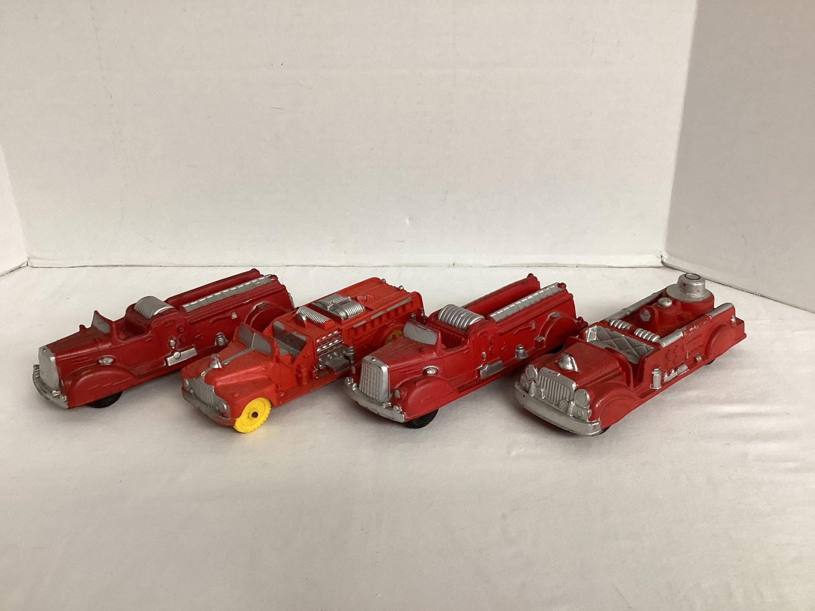 Four Auburn Rubber Fire Trucks (1 of 12)