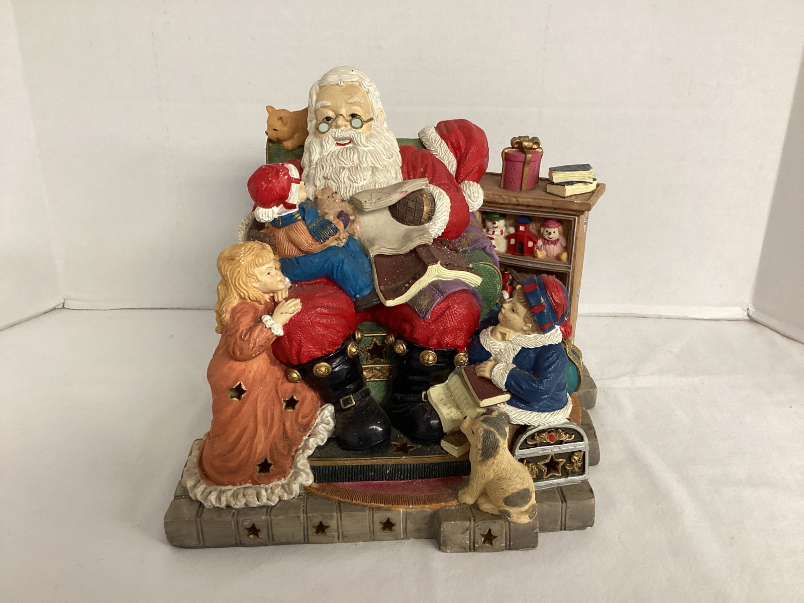 Musical Storytelling Santa Decoration: plays "Jingle Bells," missing light, 11" w x 9" d x 9 1/2" h