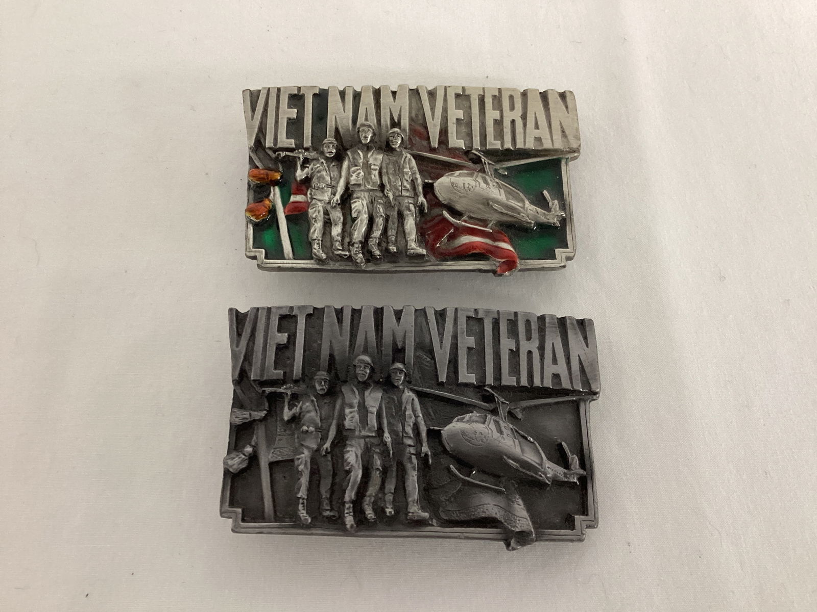 Two Vietnam Veteran Belt Buckles: .